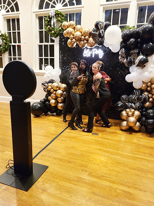 Two people having fun at the Social Photo Booth.