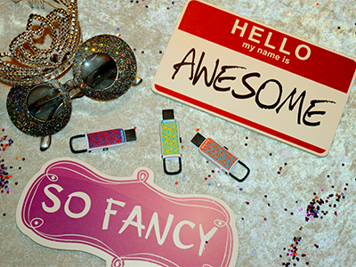 a selection of props and usb drives arranged on a table